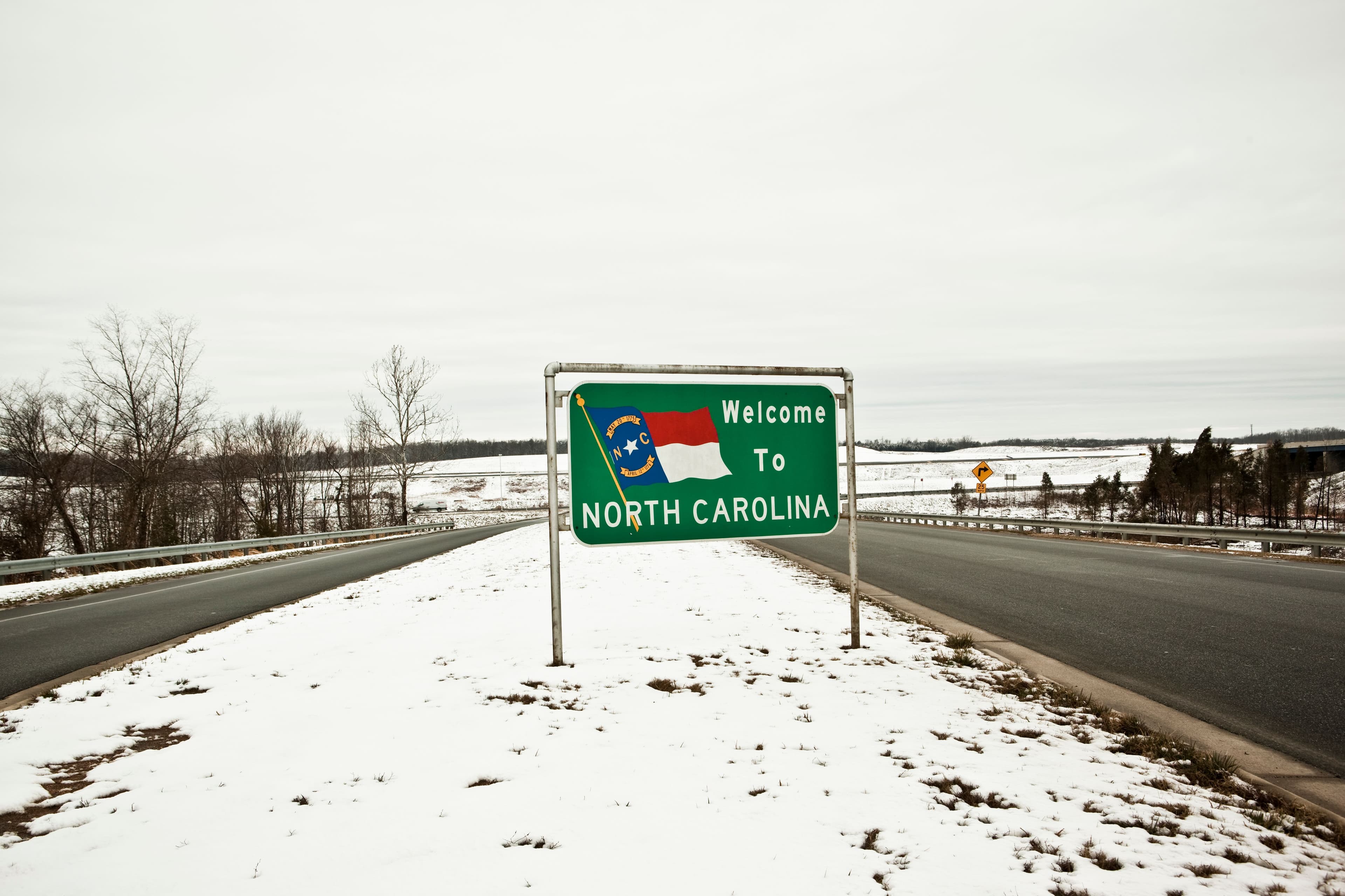 Welcome to North Carolina sign in winter.