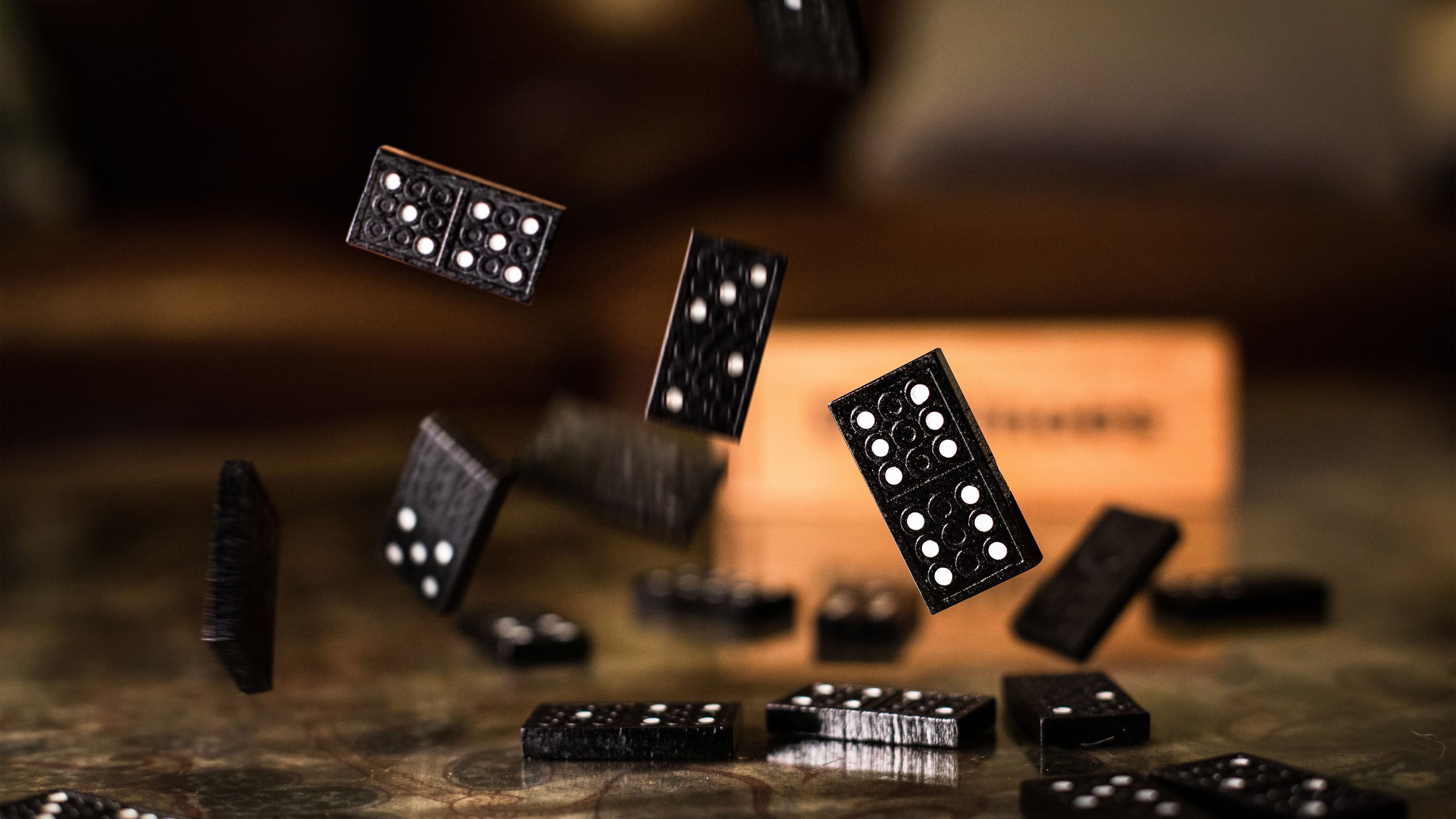 Dominoes Falling (Charl Folscher/Unsplash)