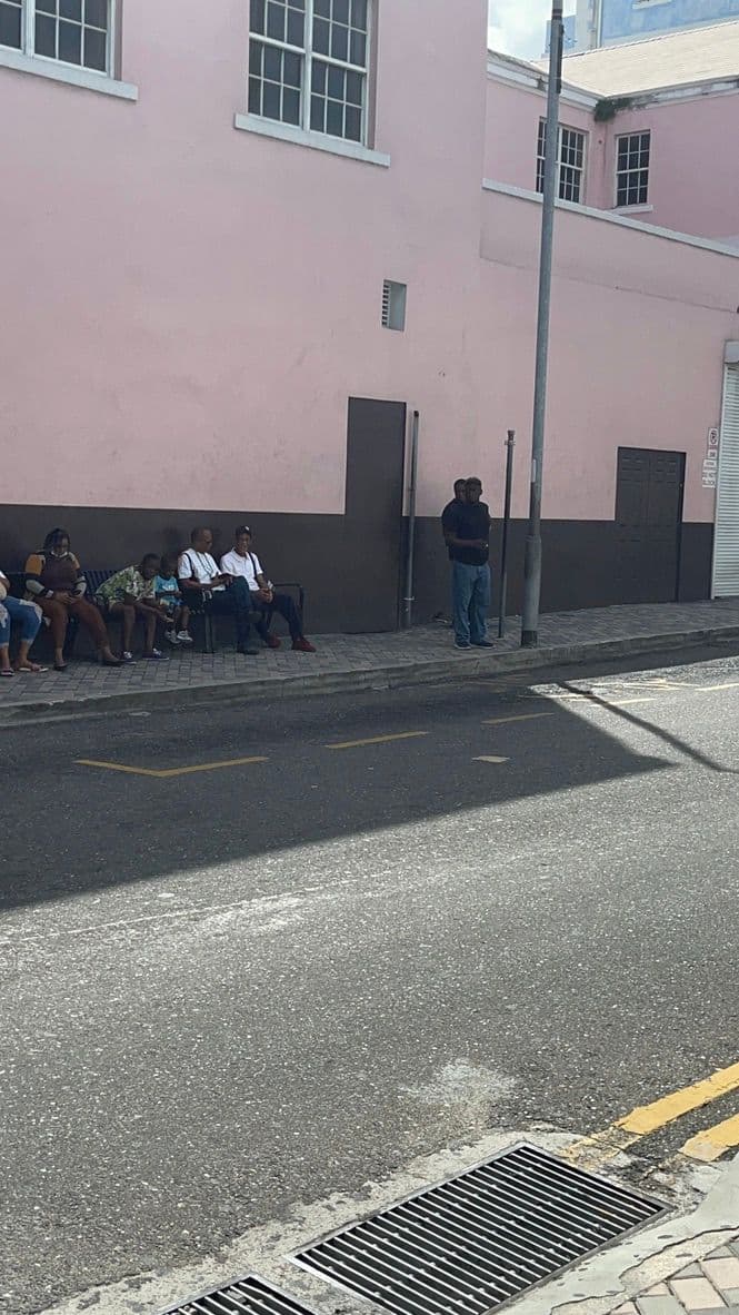 People waiting at a bus stand in the downtown area of Nassau, The Bahamas (Amitoj Singh/CoinDesk)