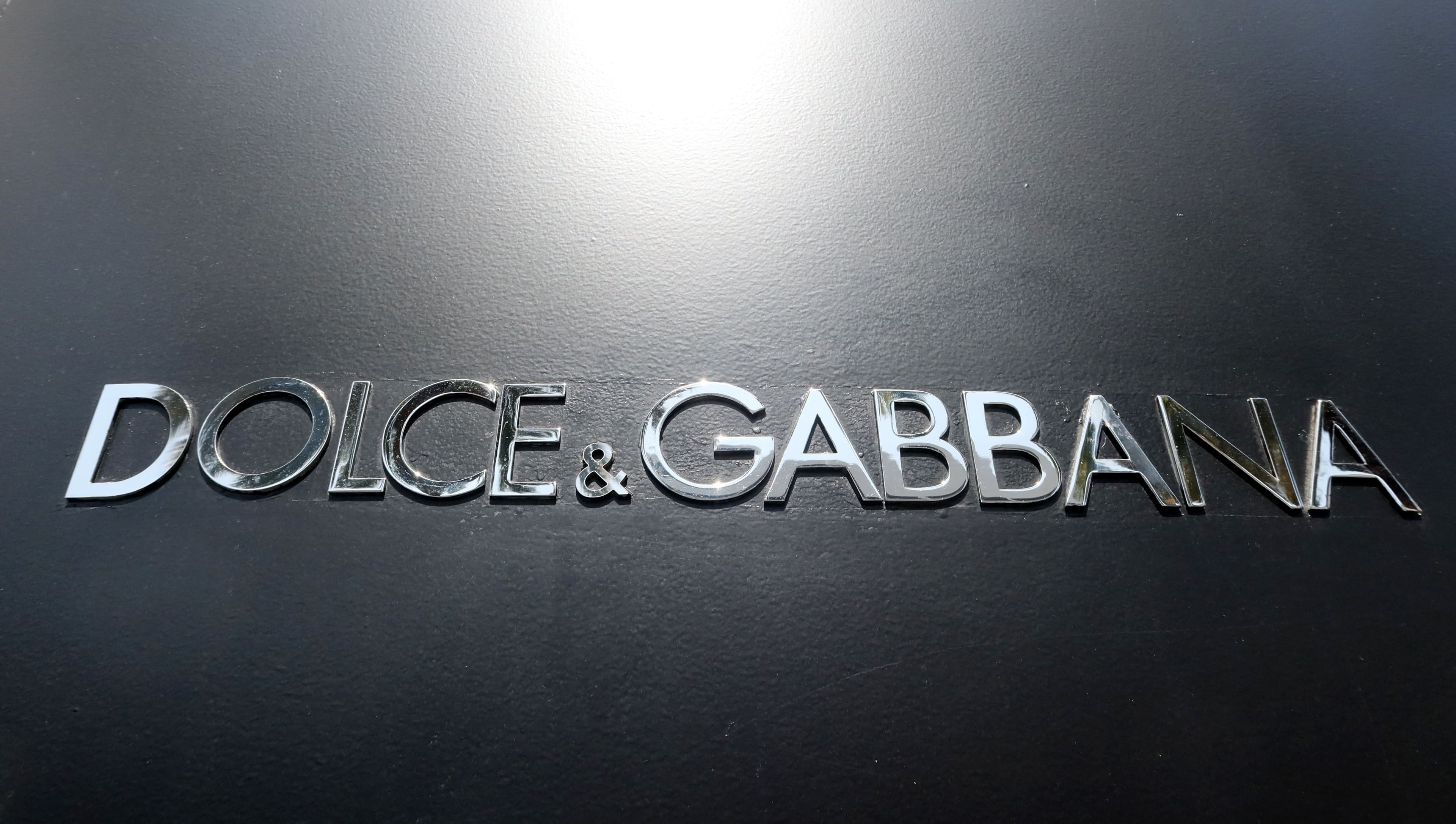 Dolce & Gabbana logo hangs on Rodeo Drive store in Los Angeles, California. (Gary Hershorn/Getty Images)