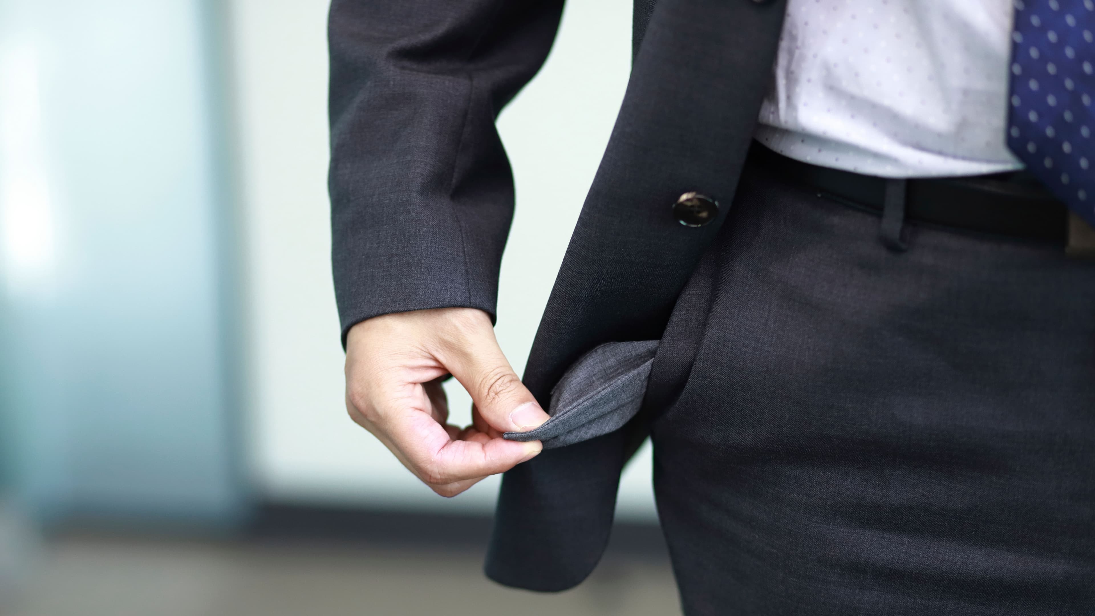 Bankrupt, close-up of man's empty pocket