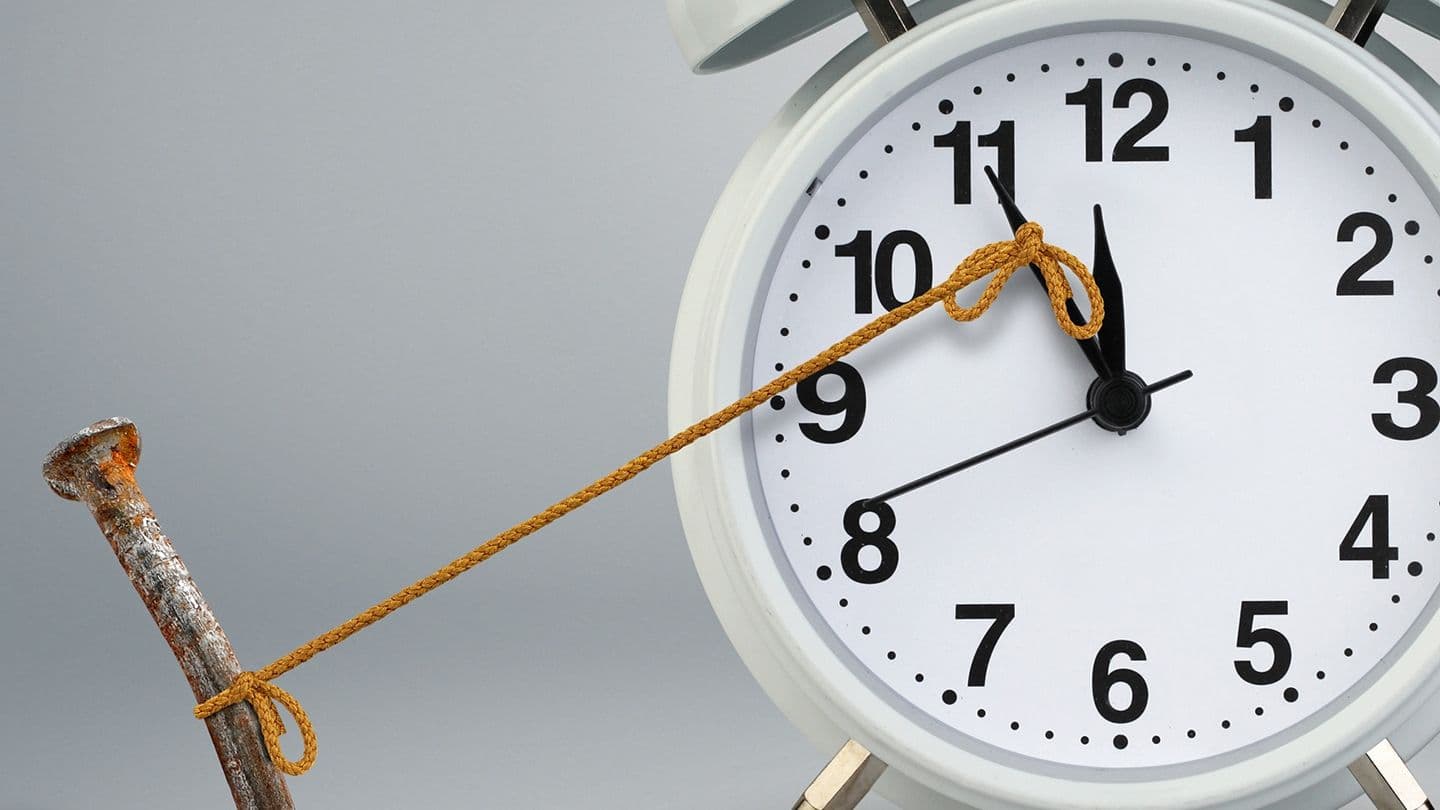 (16:9 CROP) Time on clock stop by nail delay concept.(Dimj/Shutterstock)