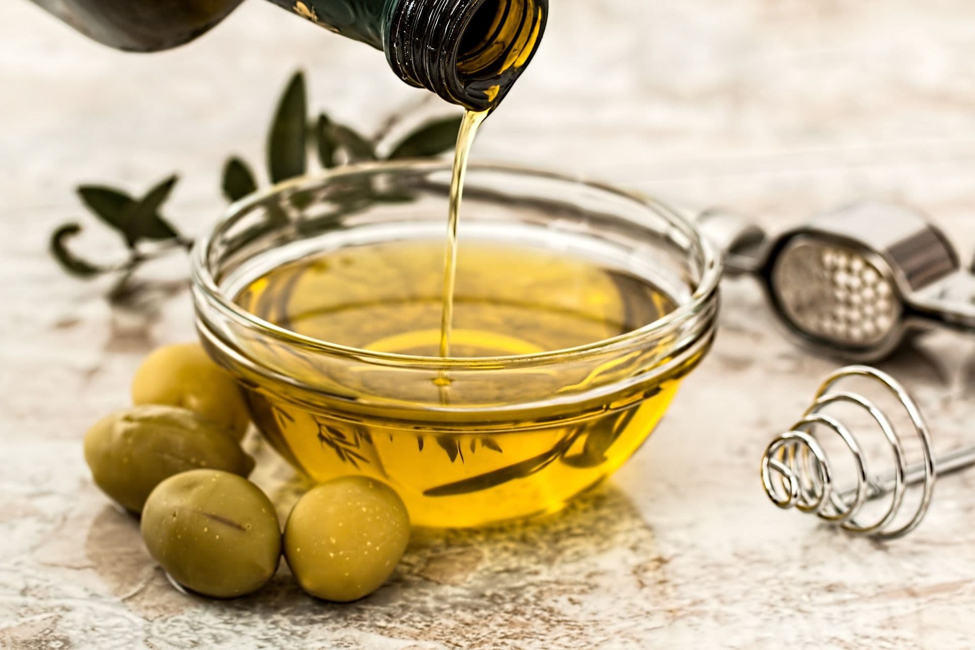 pouring olive oil