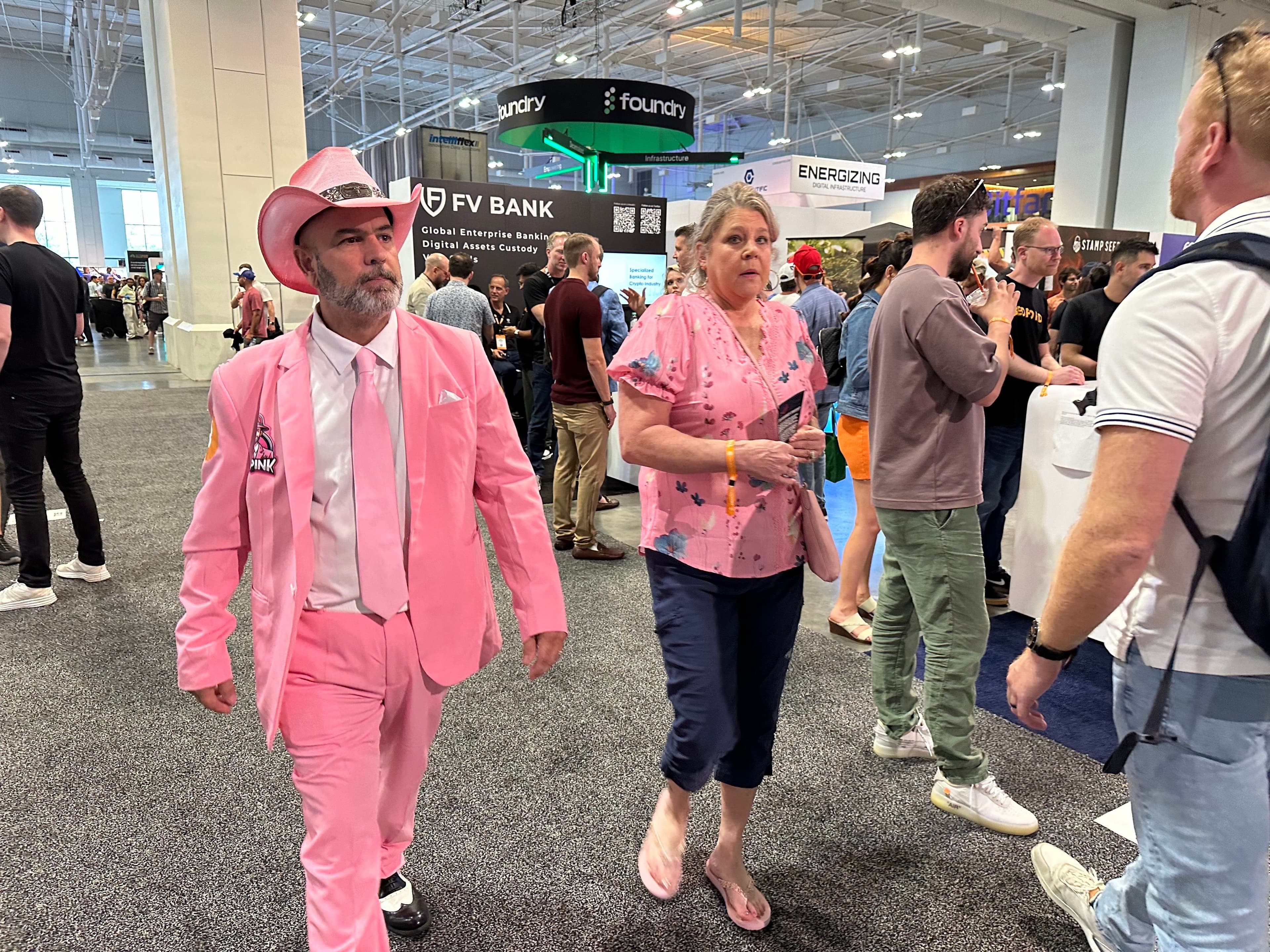 Bitcoin Nashville conference attendee in pink suit (Bradley Keoun)