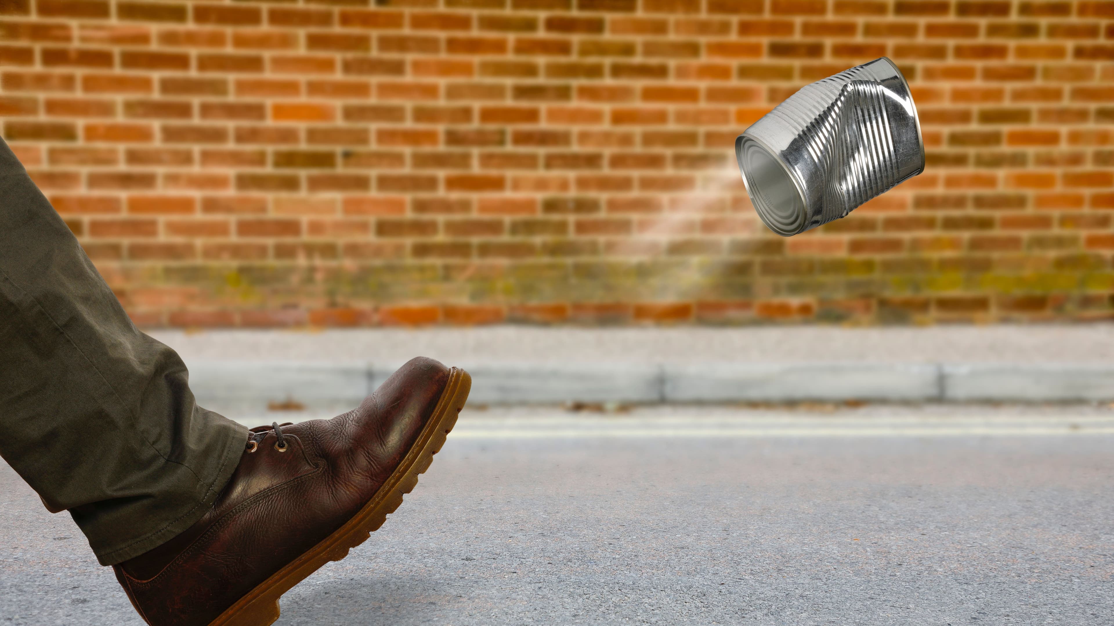 CROP 16:9 Kicking the can down the road, conceptual image (Getty Images/Science Photo Libra)