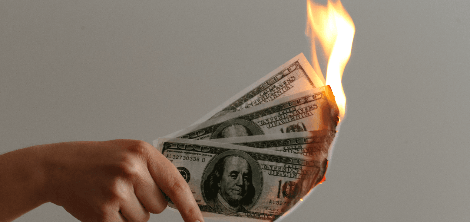 money, U.S. dollars, benjamins, cash, fire, burn, waste, 100s, scratch (Jp Valery/Unsplash)