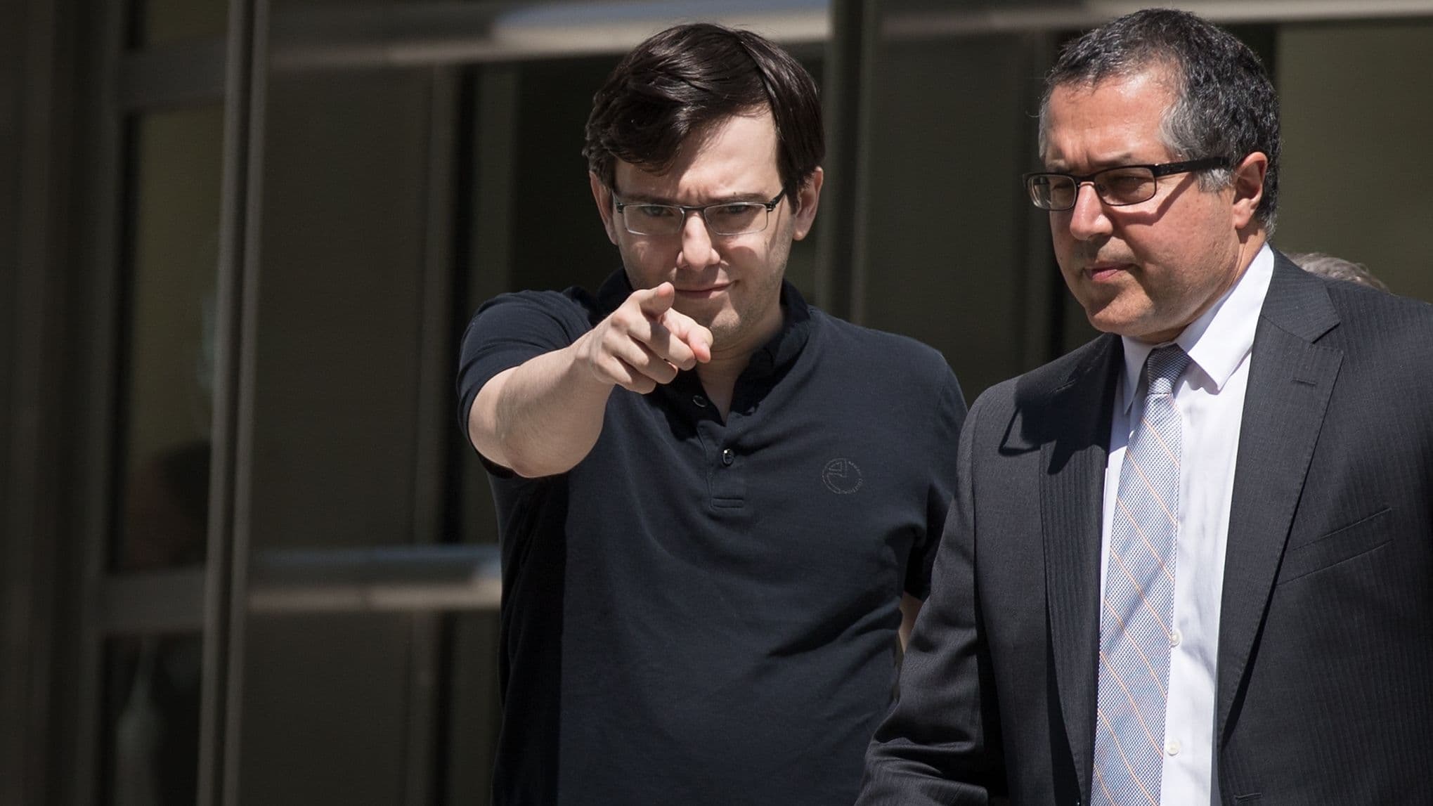 (16:9 CROP) Martin Shkreli points as he exits a courthouse (Drew Angerer/Getty Images)