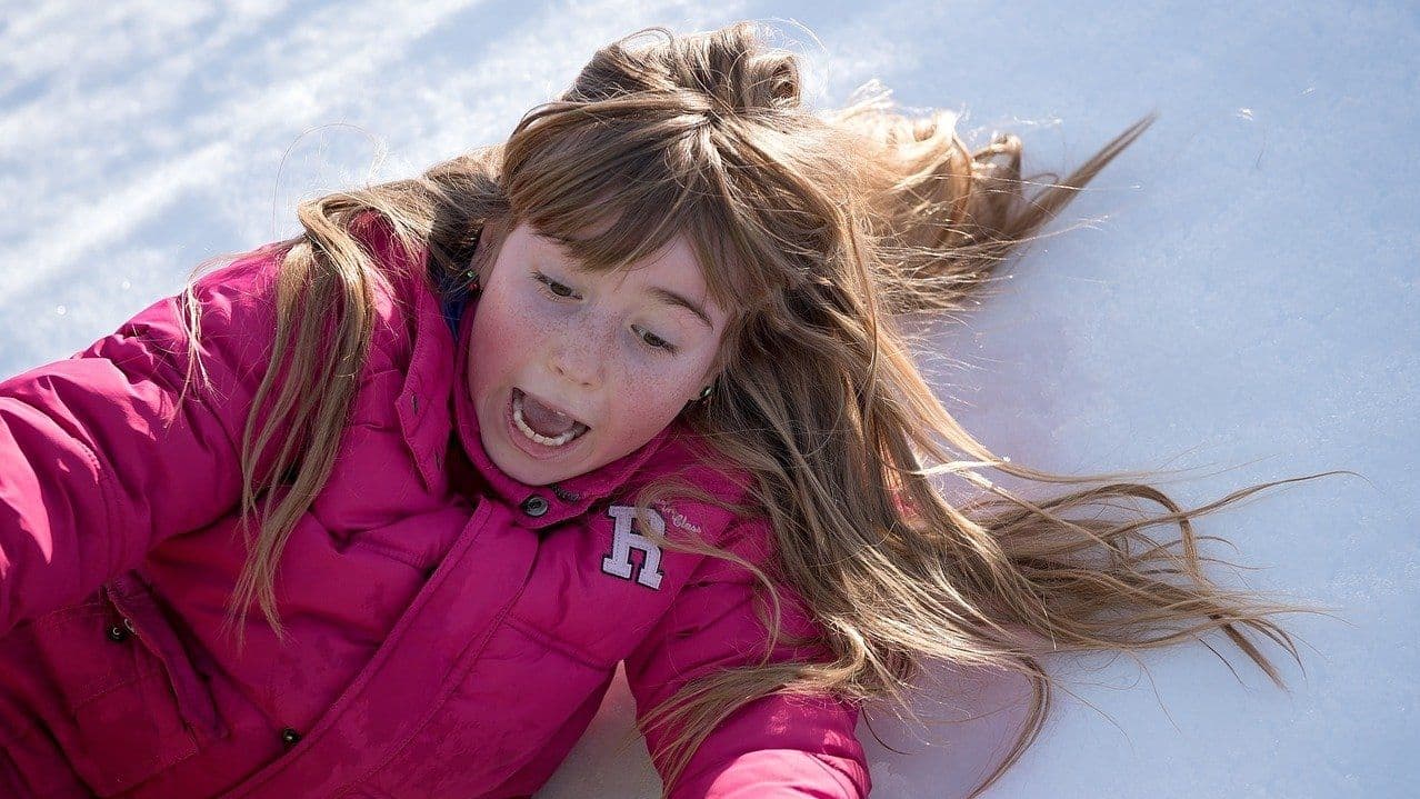 (16:9 Crop) woman sliding on snow (Pezibear/Pixabay)