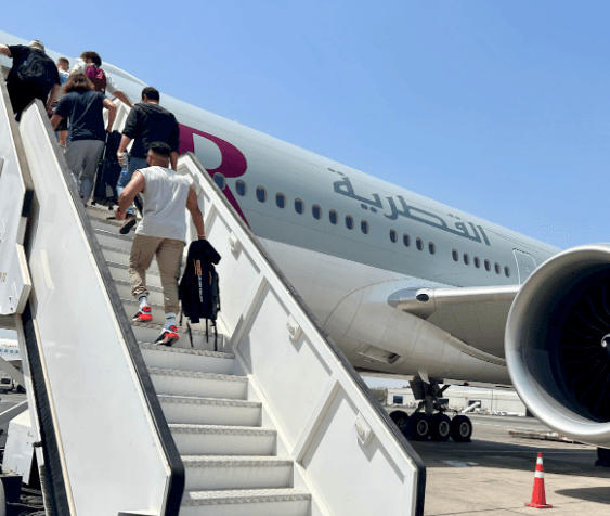 Photo of passengers boarding the plane