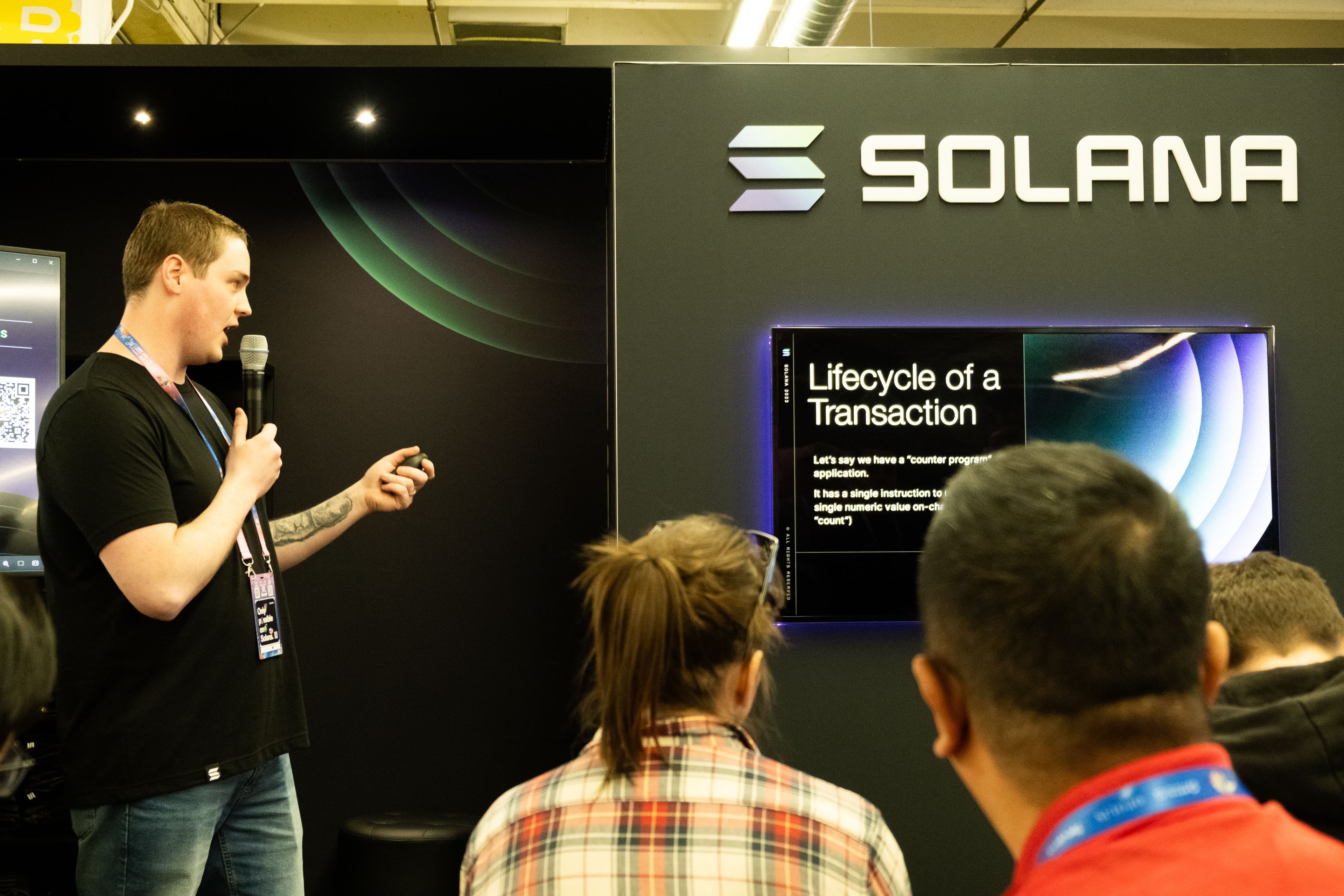 Solana booth at ETHDenver 2024 conference. (Sam Kessler)